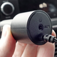 The Speak’s cigarette lighter adapter includes an AUX-out jack for routing audio through an older car’s sound system.
